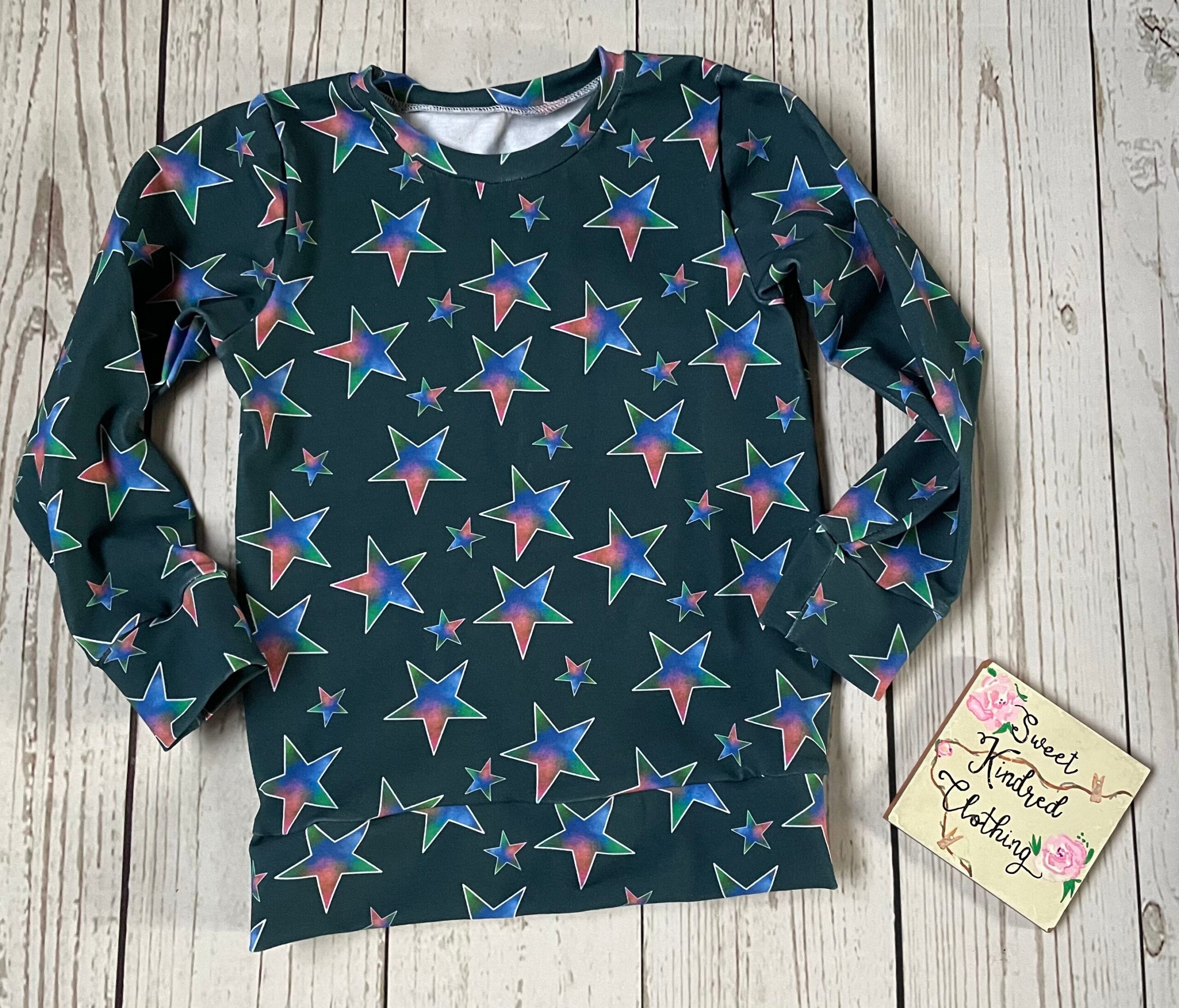 Star jumper, handmade children’s jumper, blue, pink and green stars - Image 2