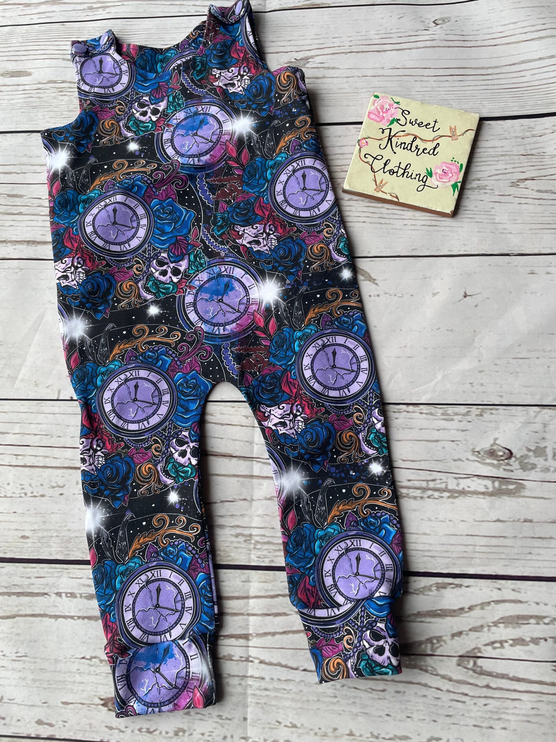 Gothic skulls, clock and rose romper